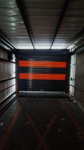 PAW-SG5 güvenlikli sarmal kapı lojistik rampası kırmızı şeritli endüstriyel kapı